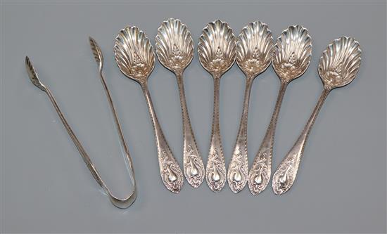 A set of six late Victorian silver shell bowl coffee spoons and tongs by Walker & Hall, Sheffield, 1895.